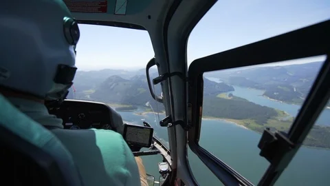 Slow Motion of Flying Over Beautiful Huge Lake Among Lush Green Mountains in Stock Footage 113944991