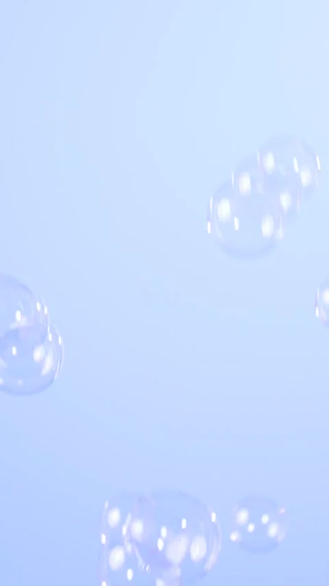 Slow motion of flying up soap bubbles. Vertical video Stock Footage 309005671