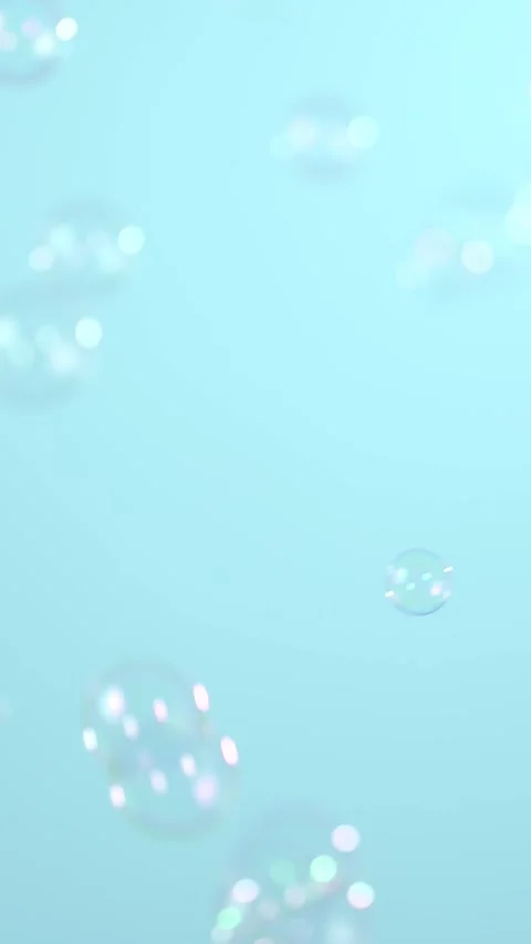 Slow motion of flying soap bubbles on blue background Stock Footage 309005677