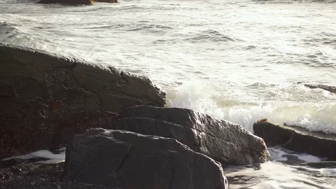 Slow Motion foam from the wave crashed Video stock 82449136