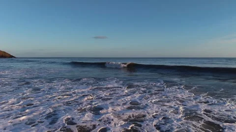 Slow Motion Foamy Ocean Surface Near Coastline in 4K 스톡 동영상 332944301