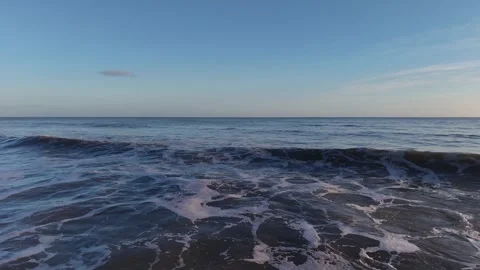 Slow Motion Foamy Ocean Surface Near Coastline in 4K 스톡 동영상 332944336