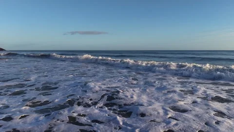 Slow Motion Foamy Ocean Surface Near Coastline in 4K Stock-Footage 332944508