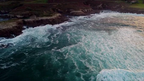 Slow Motion Of Foamy Sea Waves Crashing On The Rocky Cliffs Stock Footage 243299788