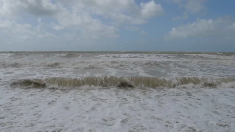 Slow Motion. Foamy waves crushing on the sea shore. Seven Sisters, England. Stock Footage 217616991