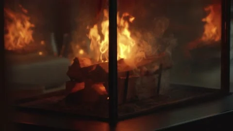 Slow motion focus pull of roaring fire inside  Stock Footage 146270525
