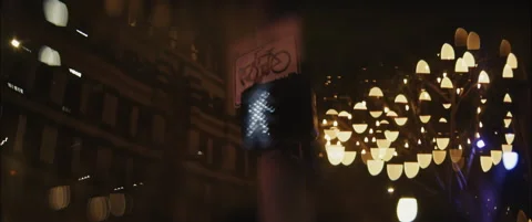 Slow Motion Focus Rack on Crosswalk Signal – Anamorphic Night Shot Stock Footage 300310343