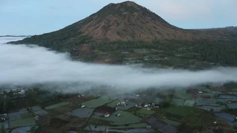 Slow motion of fog around Mount Batur Stock Footage 157613866
