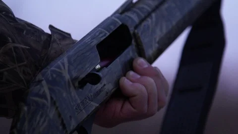 Slow Motion Footage of Automatic Shotgun Loading Stock Footage 70150856