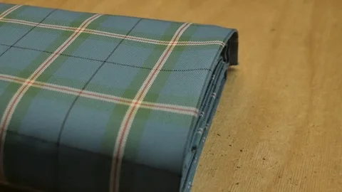 Slow motion footage - Camera on a slider over typical Scottish Tartan textile 스톡 동영상 98886129