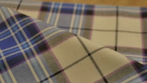 Slow motion footage - Camera on a slider over typical Scottish Tartan textile 스톡 동영상 98886162