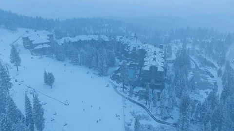 Slow motion footage capturing skier movements and snowy slopes from above Stock Footage 321435191