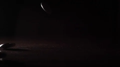 Slow motion footage of Coins fall on table Stockbeeldmateriaal 83755202