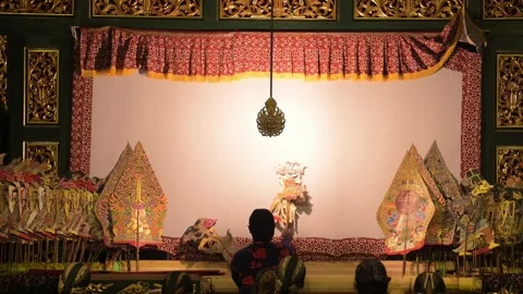 Slow motion footage of a shadow puppet performance originating from Javanese Vidéo 331749372
