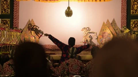 Slow motion footage of a shadow puppet performance originating from Javanese Stock Footage 331754962