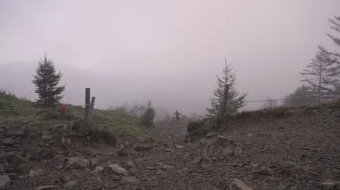 Slow motion footage of trail runner at Mount Daibosatsu in summer, Yamanashi Stock Footage 58467308