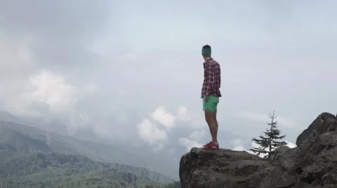 Slow motion footage of trail runner relaxing at Mount Daibosatsu in summer, Stock Footage 58467377