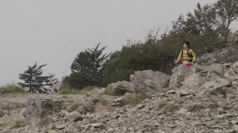 Slow motion footage of trail runner at Mount Daibosatsu in summer, Yamanashi Stock Footage 58468017