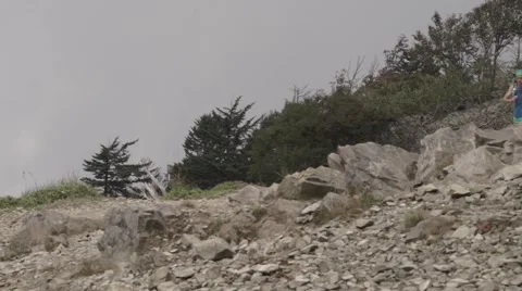 Slow motion footage of trail runner at Mount Daibosatsu in summer, Yamanashi Stock Footage 58468057