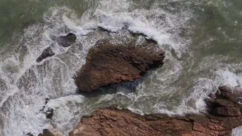 Slow-motion footage of waves hitting a rocky coastline. Majestic waves disp.. Stock Footage 280553046