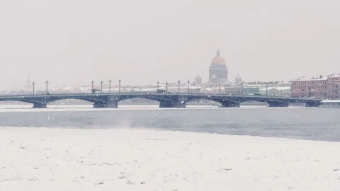 Slow motion footage of winter view of St. Petersburg at snow storm, frozen Neva Stock Footage 167034312