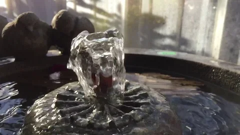 Slow-motion footagle of bubbling water in a fountain. Stock Footage 80620709