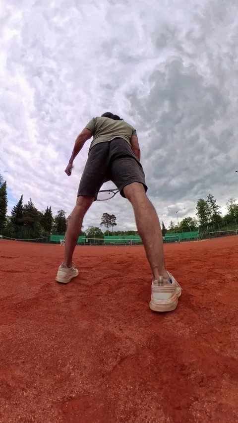 Slow motion forehand. Enjoy actionpacked tennis shots of a dedicated player in Stock Footage 315284679