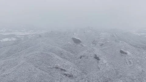 Slow Motion Forward Flight Through Heavy Snow With Low Visibility Stock Footage 344247787