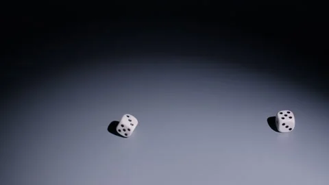 Slow-motion of Four Dice Rolling from Right to Left Stock Footage 323820738
