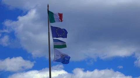 A slow motion of four flags waving in the wind. 動画素材 128472515