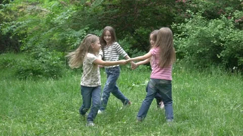 Slow Motion Four girls dance holding han... | Stock Video | Pond5