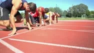 Slow Motion Of Four Sprinters On Start Stock Footage