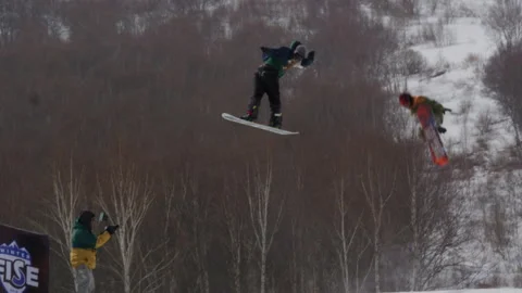 Slow Motion: Freestyle Skier Jumping in a ski resort,Zhangjiakou, China Stock Footage 135216189