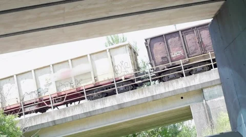 Slow motion of a freight train passing Stock Footage 51724037