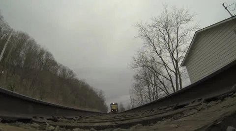 Slow Motion Freight Train from Tracks POV Stock Footage