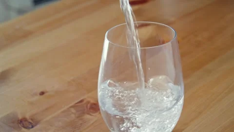 Slow Motion Fresh Water Stream Into Transparent Glass Home Stock Footage 330092200