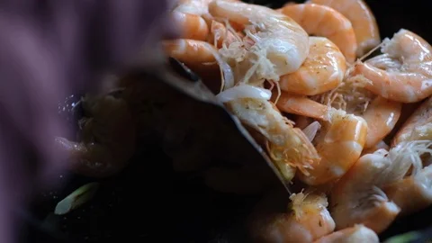 Slow motion: Fried shrimps with ginger, onion, sugar and soy sauce. Stock Footage 114643765