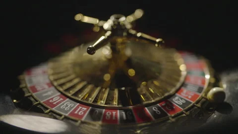 Slow motion front close-up ball on 10 in roulette Stock Footage 335699846