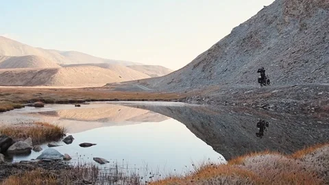 Slow motion front view adventurous traveller cycle bicycle touring solo on .. Stock-Footage 308157678