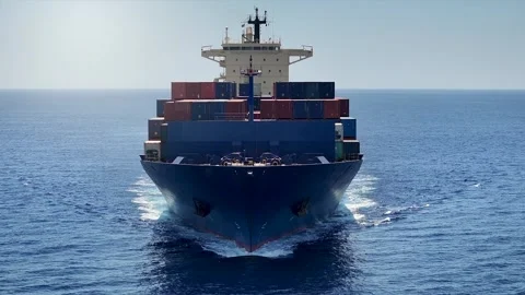 Slow motion front view of a medium sized container cargo ship Stock Footage 263474782