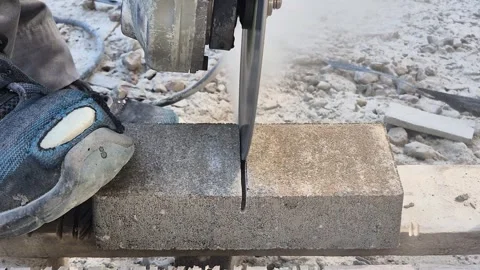Slow Motion Front View Stone Cutter Splitting Concrete Brick Stock Footage 336631367