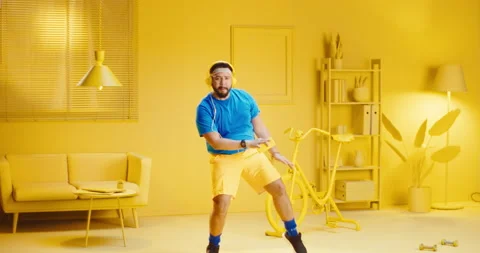 Slow motion full length of overweight young man listening to music with Stock Footage 165868082
