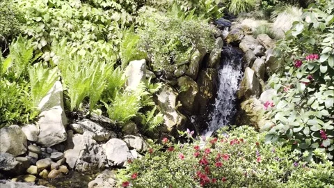 Slow Motion Garden Waterfall Rocks 4K HDR Video stock 333627403