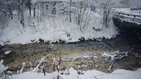 Slow motion Germans skiing across meadow below mountains Stock Footage 121755762