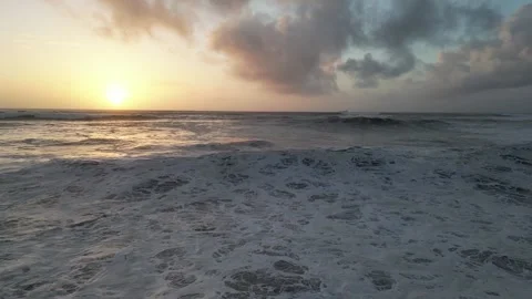 Slow Motion Giant wave w Sunset Stock Footage 229414638