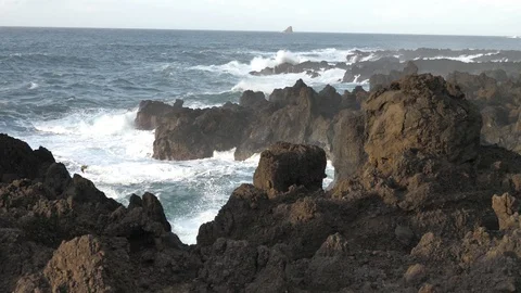 Slow Motion Giant Waves Crash Against Rocky Coastline, Flores Azores Stock Footage 89373688