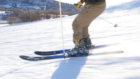 Slow Motion Gimbal Stabilized Ski Turns Backlight Sunrise Stock Footage 105001195