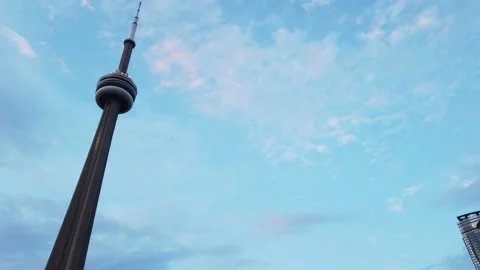 Slow Motion Gimbal Tracking CN Tower &amp; Rogers Centre on Toronto Highway Stock Footage 147688988