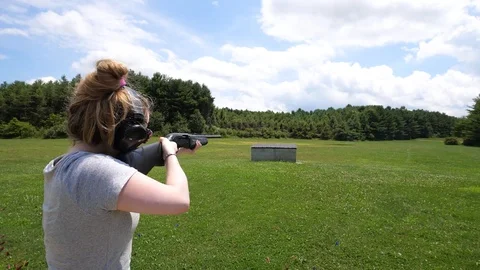 Slow Motion: Girl Shoots Gun Stock Footage