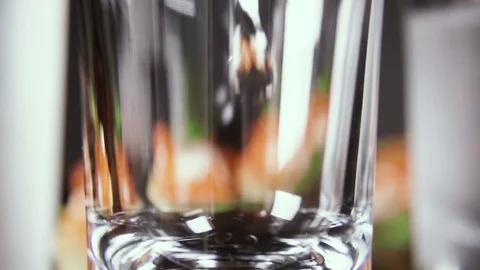 Slow motion a glass of vodka on the table with a snack Video stock 92031934